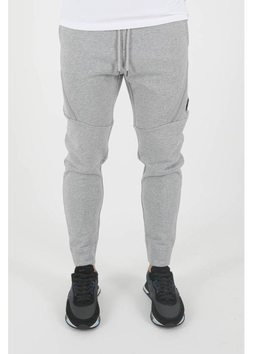 C.P. Company BAS DE JOGGING C.P COMPANY ZIPPE GRIS CPJOGGCOTONGRIS chez West Gallery Dieppe